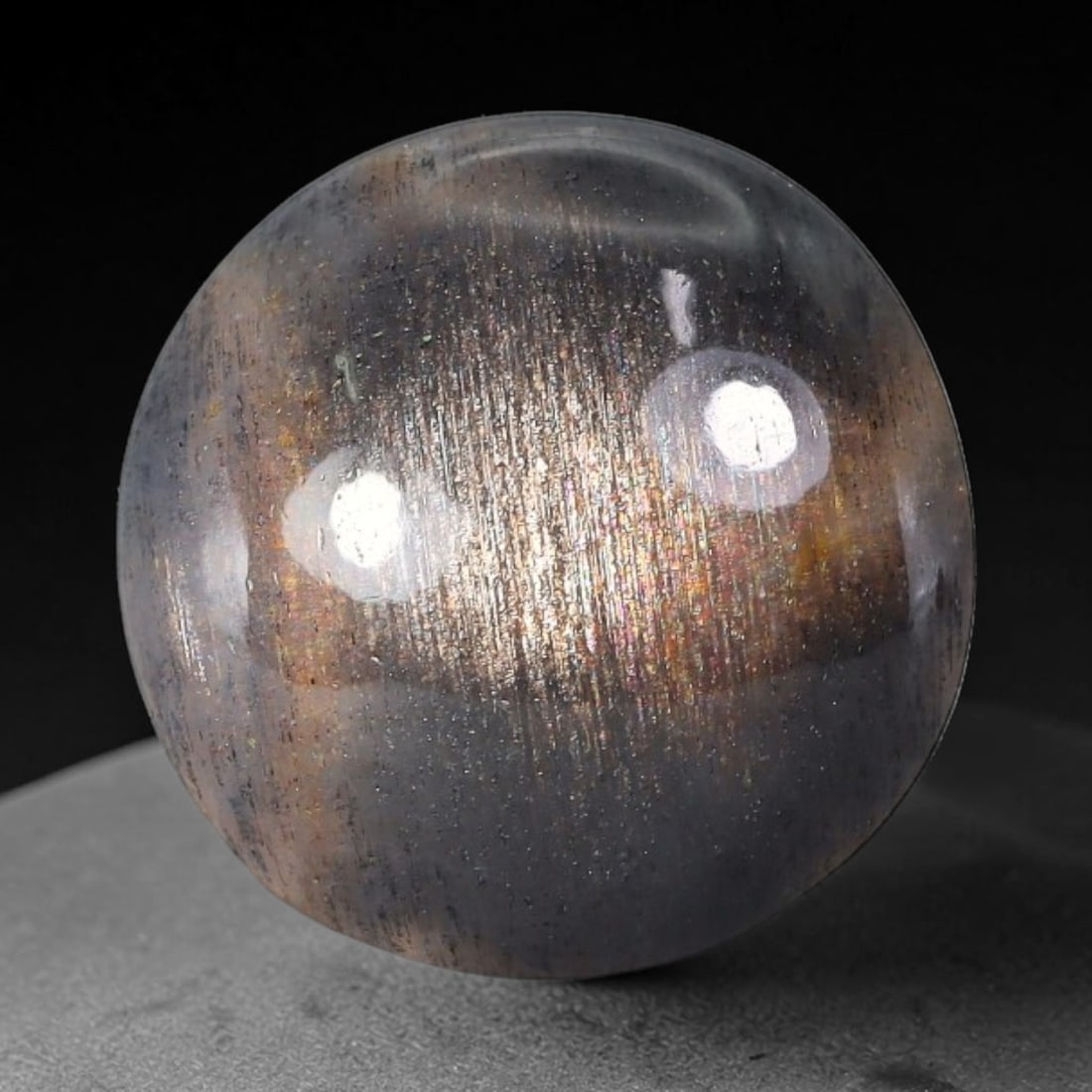 7.28 Carats Natural Australian Lattice Sunstone Cabochon Loose Gemstone, 18AG: This rich lattice sunstone boasts striking vertical mineral lattice inclusions, measured at 13.2x13.2x5.8mm, its earthy blended brown and peach base paired with vibrant multi-colored light reflections