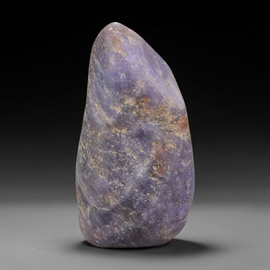 75.21ct Natural Unheated Sri Lankan Purplish Blue Sapphire Rough, 68FD: This natural corundum rough is an unheated purplish blue sapphire sourced from Sri Lankan alluvial gem deposits, featuring an irregular natural native form with residual pale yellow-brown mineral matr