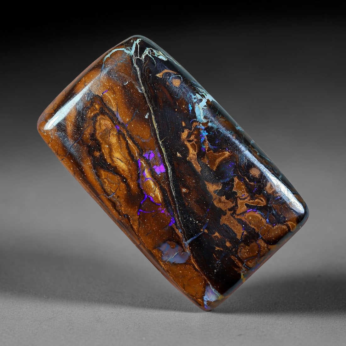 18ct Natural Australian Queensland Matrix Boulder Opal Rounded Rectangle Cabochon, 71AV: Hand polished medium rounded rectangular cabochon of natural Queensland matrix boulder opal, featuring gradient warm caramel and dark chocolate ironstone matrix with swirling layered orbicular golden 