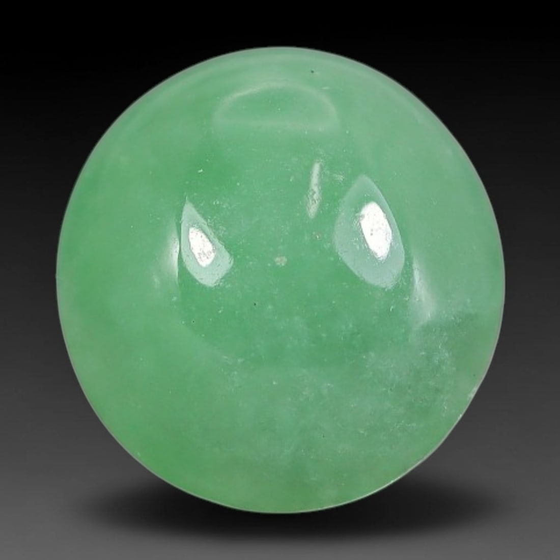 4.68ct Natural Burmese Type A Apple Green Jadeite Jade Cabochon, 80FA: This single loose natural Burmese Type A apple green jadeite jade cabochon, completely untreated, free of artificial dye, bleaching, or resin filling, preserving the original natural mineral crystal s