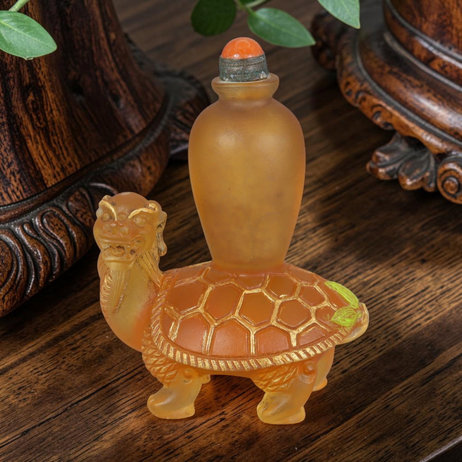 Vintage Chinese Liuli Glass Snuff Bottle - Dragon Tortoise Carrier, 41AS: This snuff bottle is crafted from frosted amber liuli glass, with the main vessel seated atop a carved dragon tortoise base. The tortoise shell is detailed with gilded hexagonal scale patterns and fac