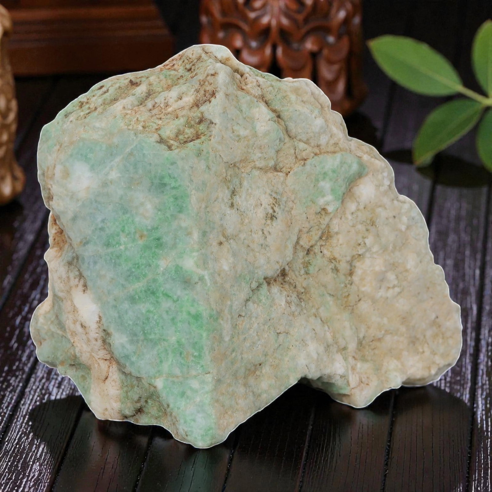1120ct Natural Burmese Light Green Jadeite Rough - Raw Earthy Toned Stone, 70EA: This is a natural Type A Burmese jadeite rough stone, measuring 8.3x6.3cm and weighing 1120ct. It features soft, natural light green formations set against a muted off-white and earthy-toned base, cre