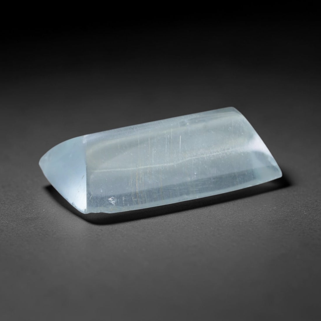 2.30 Carats Natural Brazilian Sky Blue Sugarloaf Aquamarine Loose Gemstone, 67AG: This smooth sugarloaf aquamarine features soft milky sky blue coloring with fine natural fibrous internal inclusions that lend gentle diffused luster across its polished surface, measured at 11.6x7x3.
