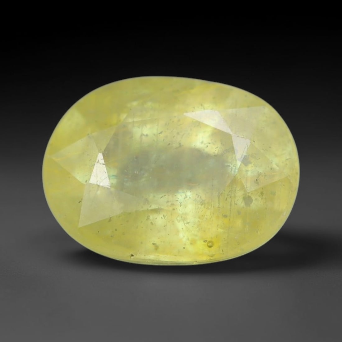 1.46 Carats Natural African Bright Lemon Yellow Sapphire Loose Gemstone, 24AG: This vivid lemon yellow sapphire radiates warm saturated golden hue with crisp faceted light dispersion, measured at 7.4x5.4x3.9mm, fine natural internal needle inclusions add authentic organic charac