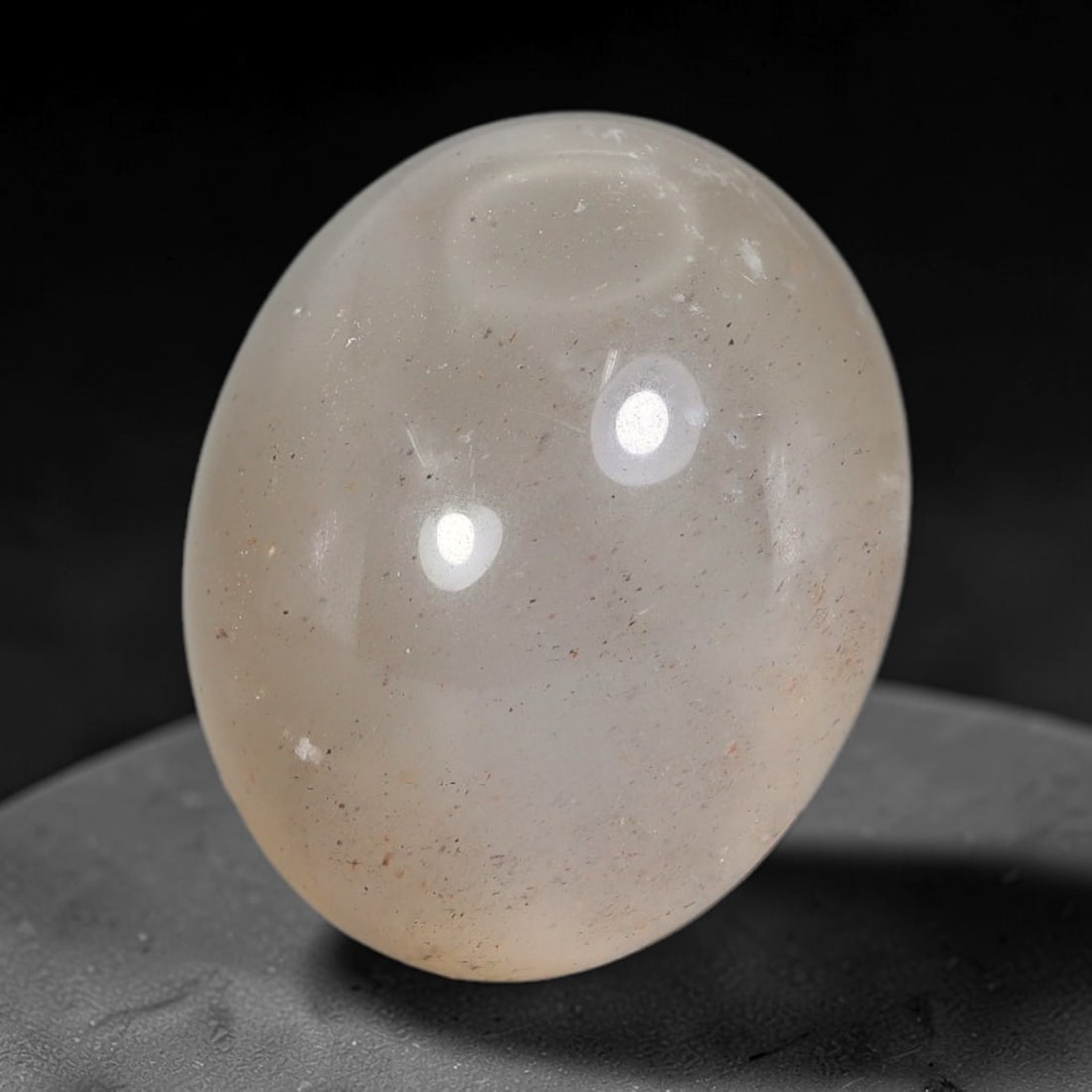 22.26 Carats Natural Ceylon Pale Taupe White Moonstone Cabochon Loose Gemstone, 95AB: This gentle pale taupe white moonstone displays a smooth silky body with soft diffused adularescent sheen across its surface, measured at 20x16.5x10mm, its muted neutral tone delivers quiet refined be