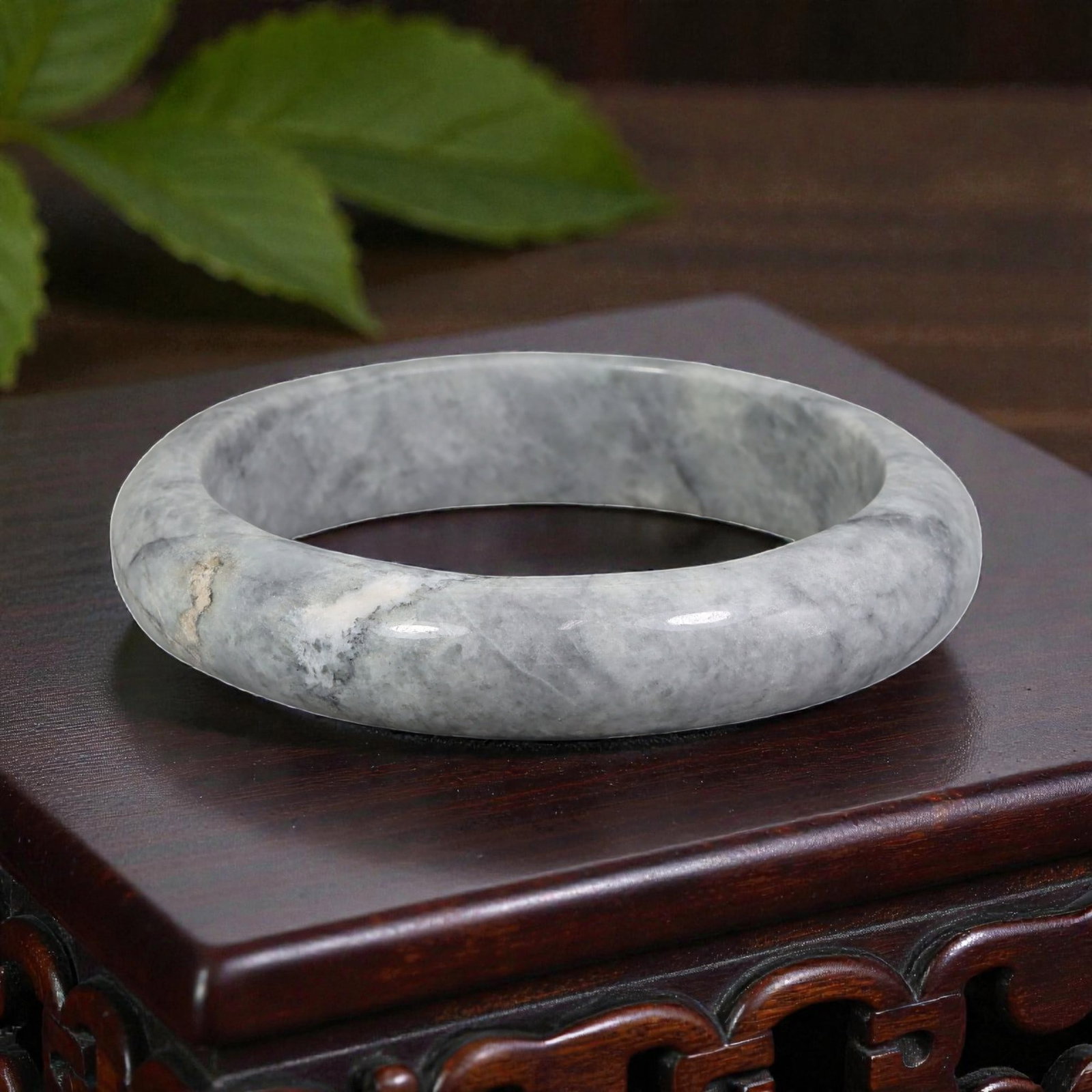 Natural Burmese Type A Grey & White Jadeite Bangle - Smoky Marble Bracelet, 32EA: This is a wide, solid bangle crafted from natural Burmese Type A jadeite, displaying a soft smoky grey base with natural white and black marbling throughout the polished stone, evoking the texture of 