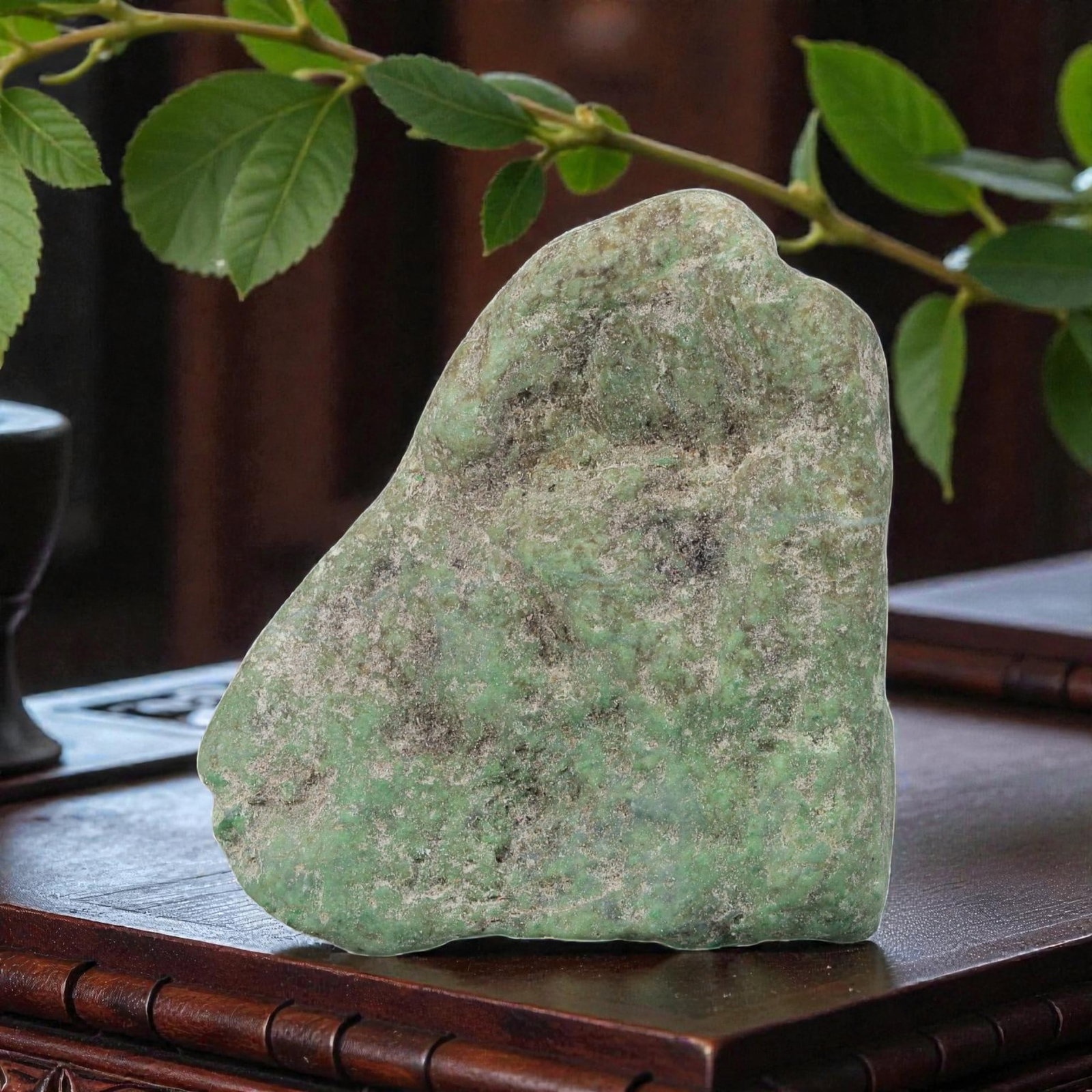 180Ct Natural Type A Burmese Jadeite Jade Rough Stone - Green Raw Materialc, 38EA: This is a natural, unpolished rough stone of Type A Burmese jadeite jade, weighing 180 carats and measuring 4.5x3.5cm. The stone features a muted green base with natural mineral deposits, subtle tonal