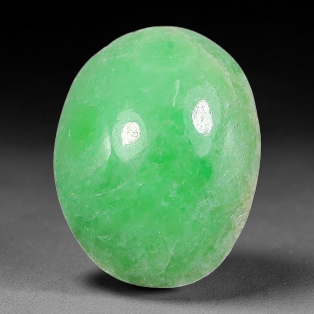 3.40ct Natural Burmese Type A Apple Green Jadeite Jade Cabochon, 70FA: This single loose natural Burmese Type A apple green jadeite jade cabochon, completely untreated, free of artificial dye, bleaching, or resin filling, preserving the original natural mineral crystal s