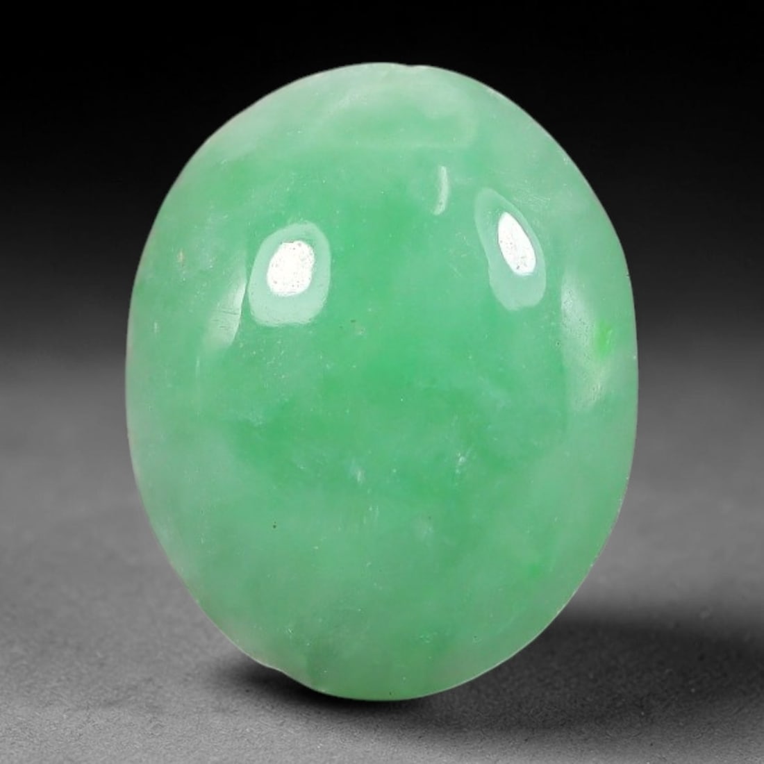 4.83ct Natural Burmese Type A Apple Green Jadeite Jade Cabochon, 81FA: This single loose natural Burmese Type A apple green jadeite jade cabochon, completely untreated, free of artificial dye, bleaching, or resin filling, preserving the original natural mineral crystal s