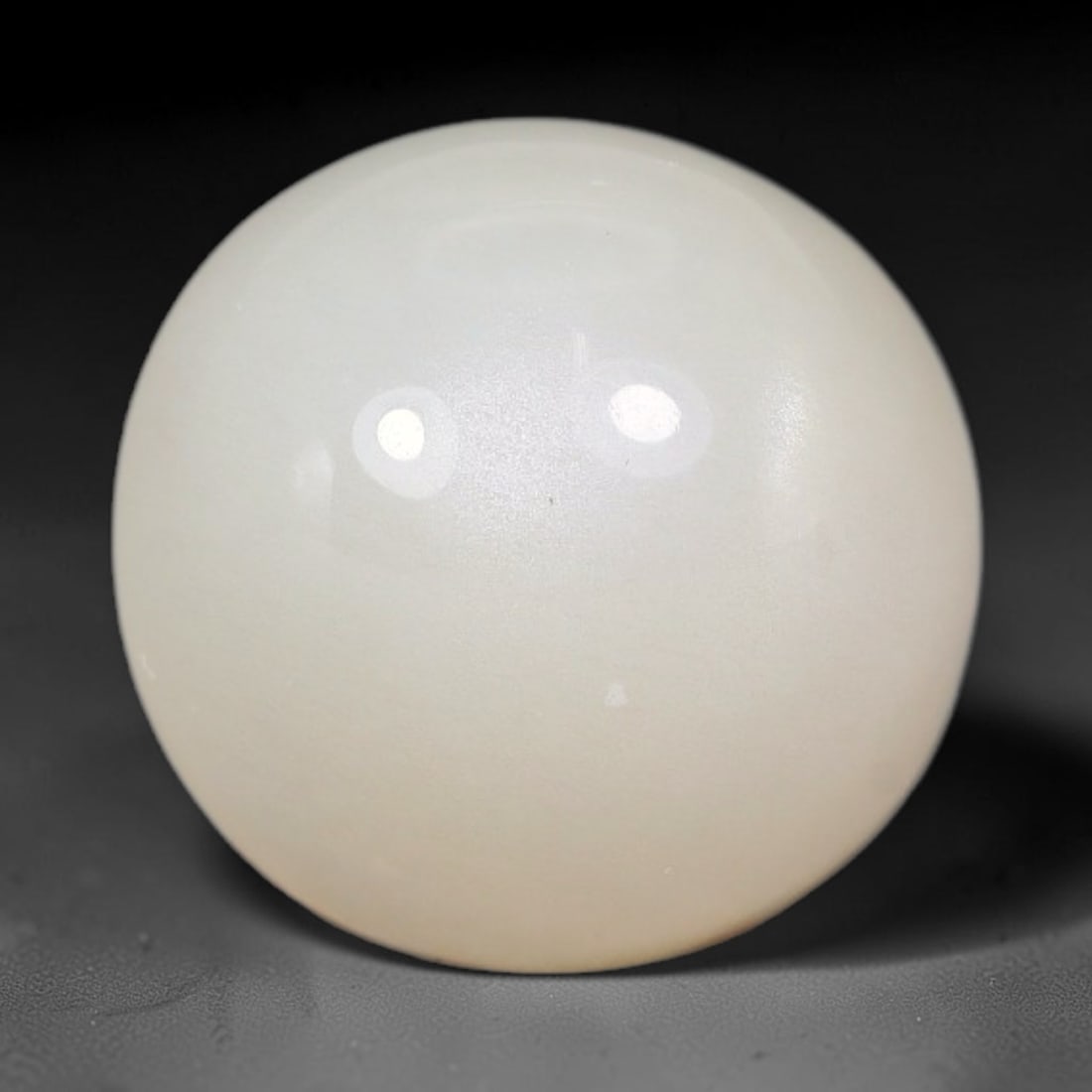 8.20 Carats Natural Ceylon Soft Milky White Moonstone Cabochon Loose Gemstone, 16AG: This serene milky white moonstone carries a smooth, diffused pale hue with subtle gentle adularescent glow that softens under every light source, measured at 12x7mm, the even muted tone delivers under