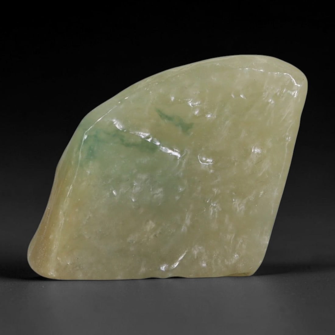 135ct Natural Type A Burmese Jadeite Jade Polished Sliced Rough, 88AZ: This specimen is a sliced rough block of natural Type A Burmese jadeite jade. The interior displays natural colour zoning with visible mineral veining and crystalline patterns typical of unprocessed j