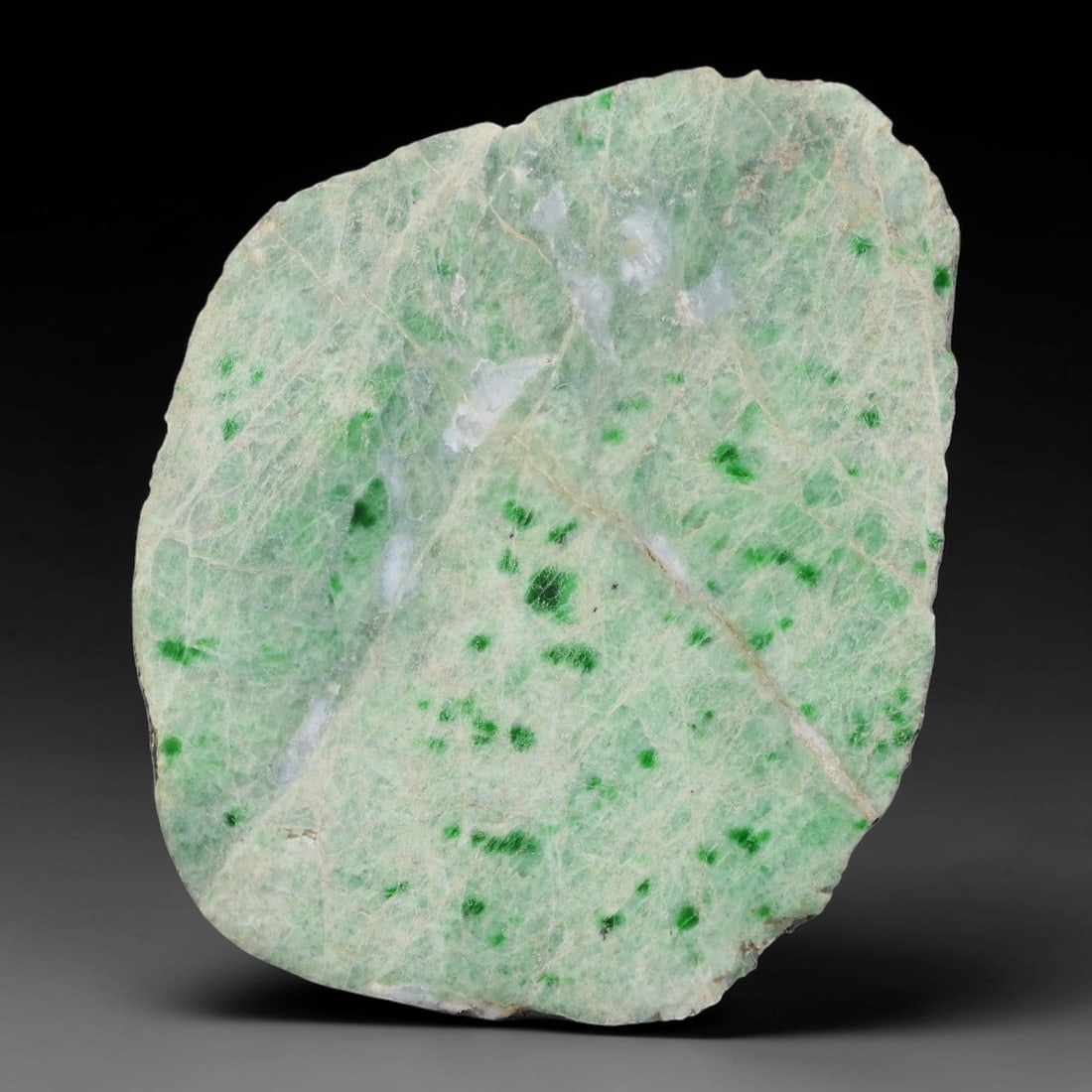 390ct Natural Type A Burmese Jadeite Jade Sliced Rough, 56AZ: This specimen is a sliced rough block of natural Type A Burmese jadeite jade. The interior displays natural colour zoning with visible mineral veining and crystalline patterns typical of unprocessed j
