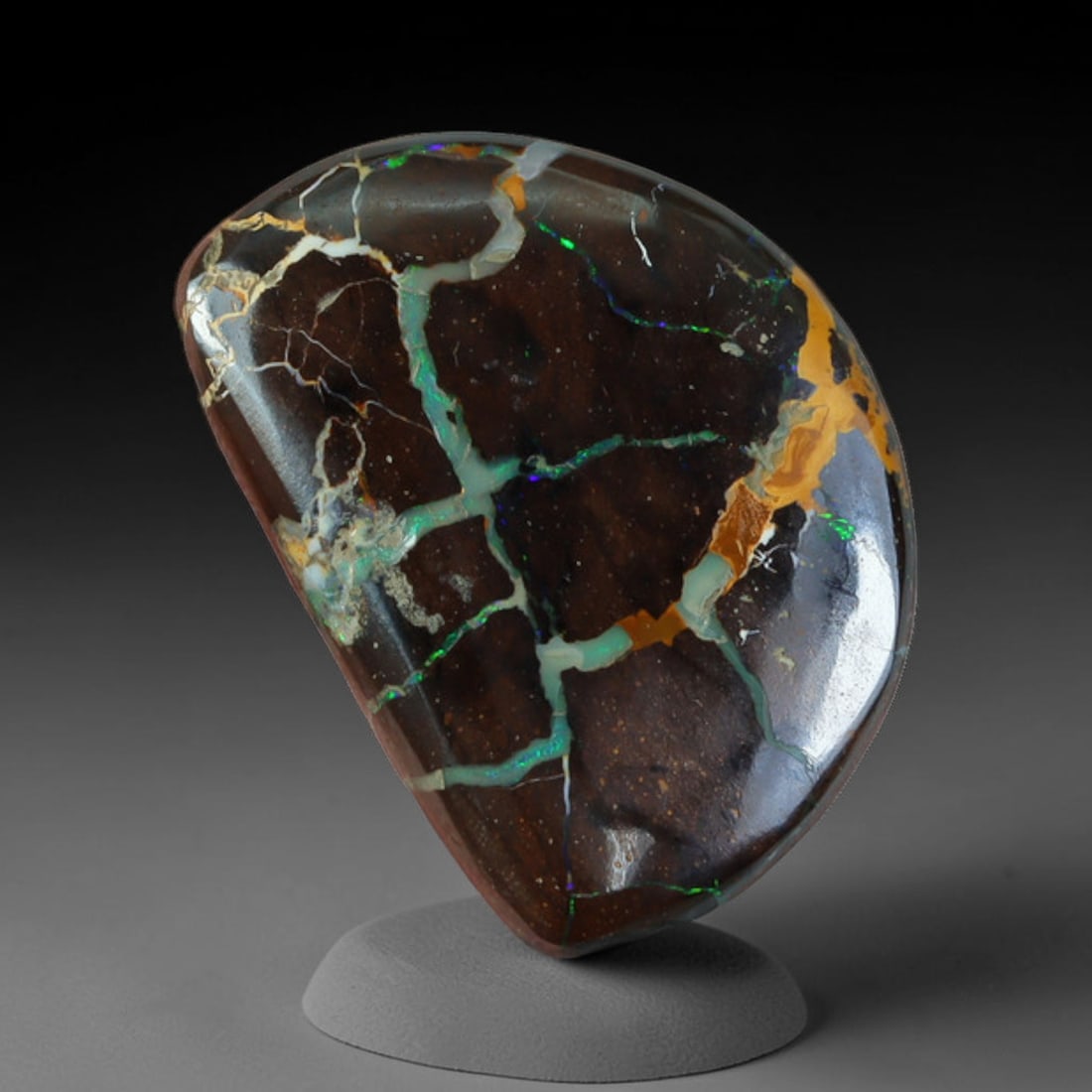 10.62ct Natural Australian Queensland Matrix Boulder Opal Freeform Teardrop Cabochon, 56AX: Hand polished organic freeform teardrop cabochon of natural Queensland matrix boulder opal, featuring deep dark granular ironstone matrix crisscrossed with thick branching opal veins blending pale mil