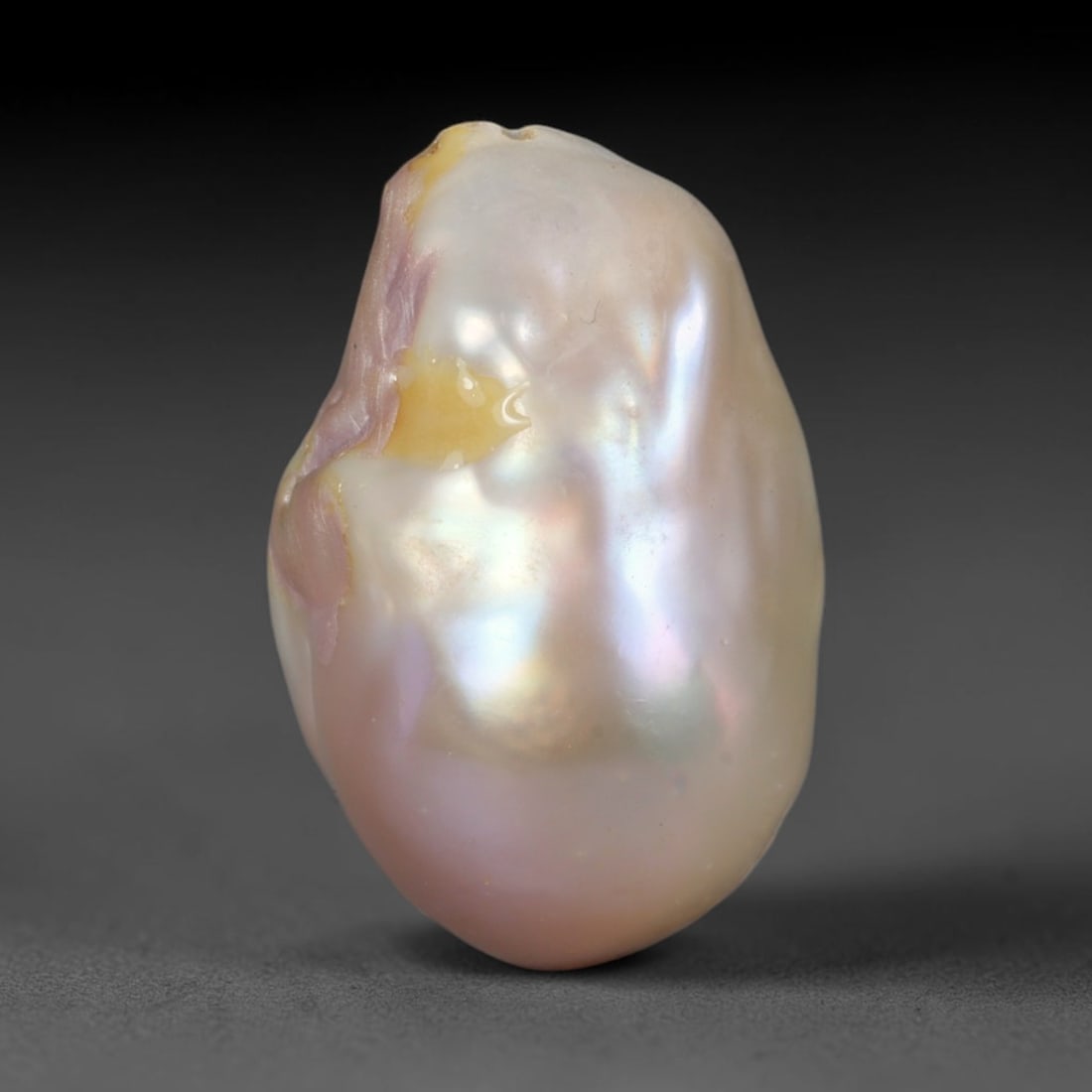 Natural Freshwater Keshi Pearl - Iridescent Baroque Pearl Ornament, 61AE: A natural freshwater keshi pearl with organic asymmetrical baroque shaping, exhibiting soft creamy blush base tones with shifting pastel pink, lavender and pale gold iridescent luster across its smoot