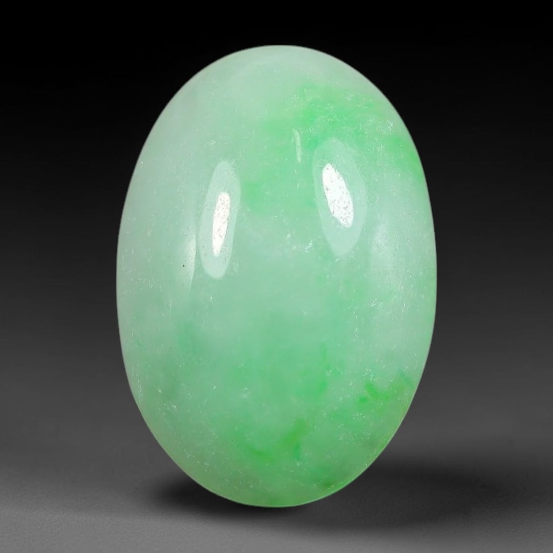 4.66ct Natural Burmese Type A Apple Green Jadeite Jade Cabochon, 83FA: This single loose natural Burmese Type A apple green jadeite jade cabochon, completely untreated, free of artificial dye, bleaching, or resin filling, preserving the original natural mineral crystal s