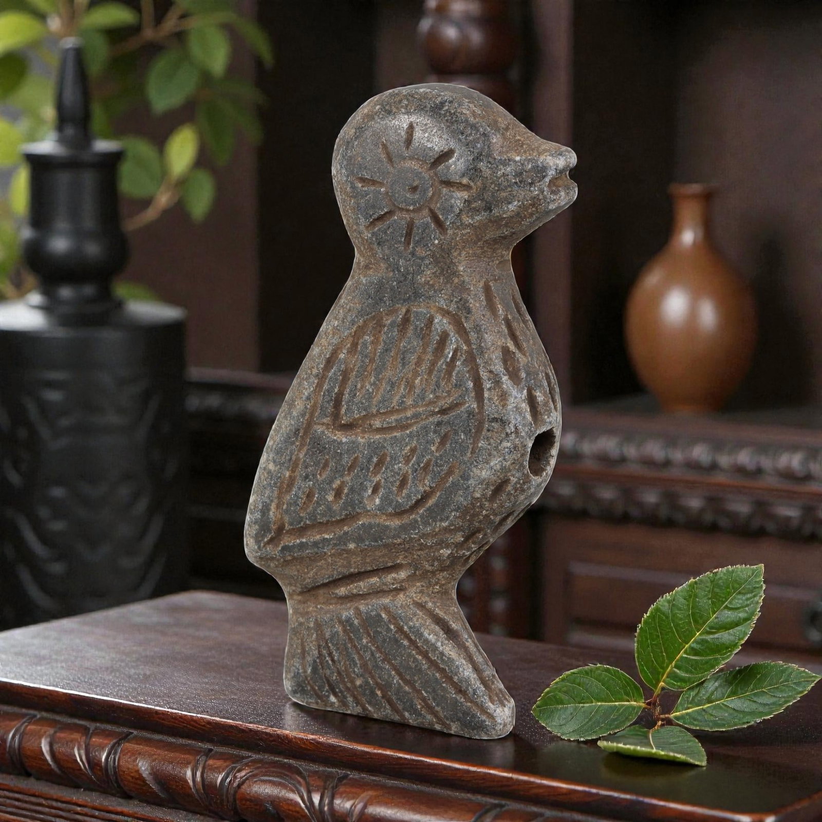 Antique Medieval Silk Road Schist Bird Effigy Artifact, 89AN: Carved from weathered grey schist, this stylized bird effigy is characteristic of medieval Silk Road craftsmanship. The figure features a sunburst motif incised on the head, with linear carvings detai