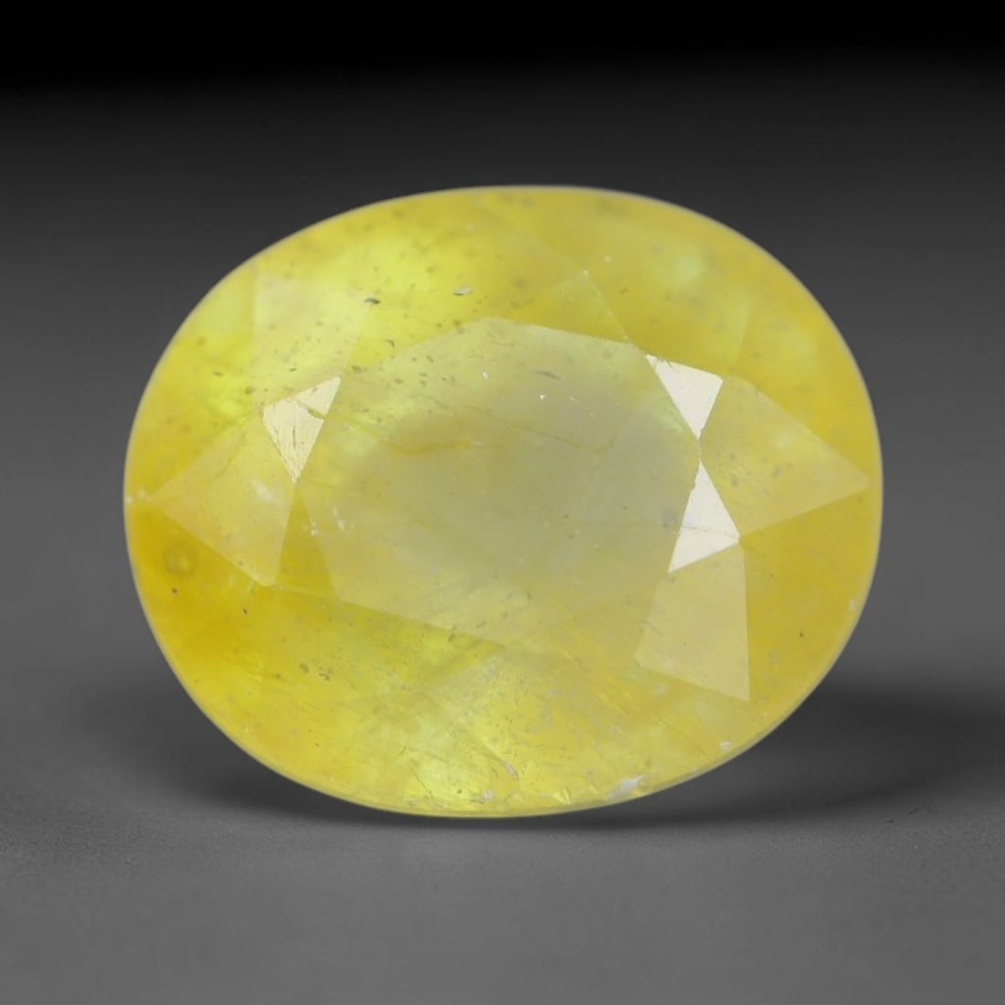 2.38 Carats Natural African Bright Lemon Yellow Sapphire Loose Gemstone, 28AG: This vivid lemon yellow sapphire radiates warm saturated golden hue with crisp faceted light dispersion, measured at 7.8x6.5x5.3mm, fine natural internal needle inclusions add authentic organic charac