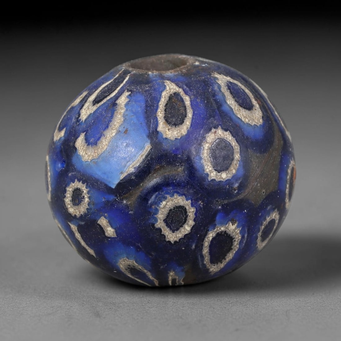 Antique Borneo Glass Trade Bead - 19mm Vintage Handcrafted Bead, 8AA: Antique Borneo glass beads hold deep cultural and historical significance within Southeast Asian maritime trade networks. For centuries, these glass spheres circulated as vital currency, ceremonial ta