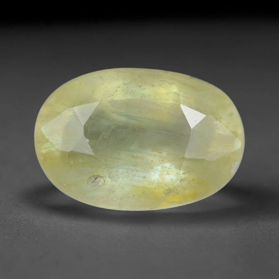 2.52 Carats Natural African Bright Lemon Yellow Sapphire Loose Gemstone, 29AG: This vivid lemon yellow sapphire radiates warm saturated golden hue with crisp faceted light dispersion, measured at 9.3x6.3x4.5mm, fine natural internal needle inclusions add authentic organic charac
