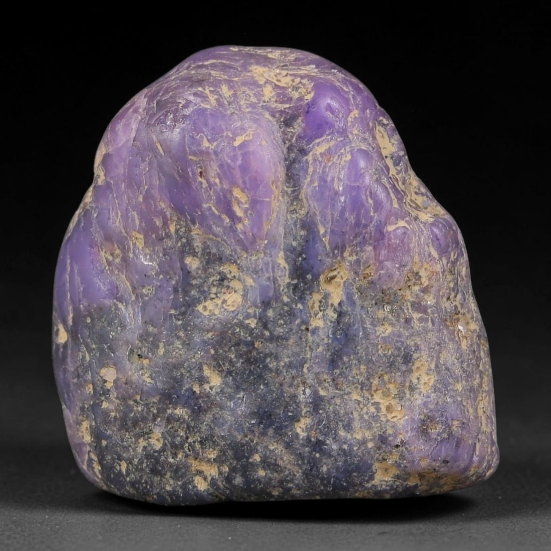 41.86ct Natural Unheated Sri Lankan Purplish Blue Sapphire Rough, 32FC: This natural corundum rough is an unheated purplish blue sapphire sourced from Sri Lankan alluvial gem deposits, featuring an irregular natural native form with residual pale yellow-brown mineral matr