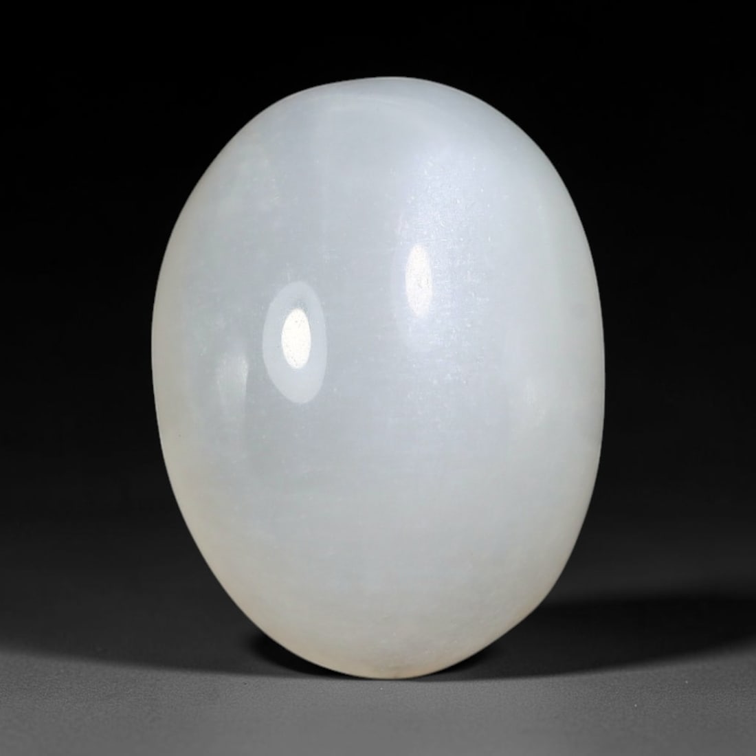 20.09 Carats Natural Ceylon Soft Milky White Moonstone Cabochon Loose Gemstone, 97AB: This serene milky white moonstone carries a smooth, diffused pale hue with subtle gentle adularescent glow that softens under every light source, measured at 20.3x15x8.8mm, the even muted tone deliver