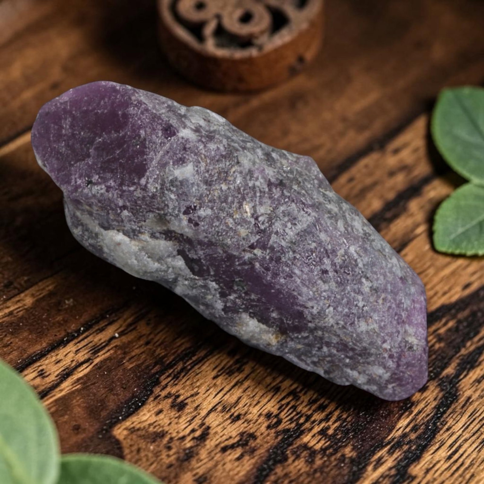 20.30ct Natural Mauritania Ruby Rough (Unheated), 89AM: This unheated Mauritania ruby rough is a captivating natural crystal specimen, featuring vivid magenta-purple ruby formations embedded in a contrasting greyish matrix. The stone's rugged, unpolished s