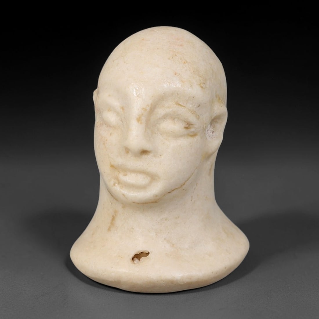 Ancient Bactrian Margiana Marble Idol Bust Amulet (2300-1700 BCE), 2AB: Miniature hand-carved pale marble bust idol from Bactrian-Margiana Archaeological Complex civilisation, crafted as a small devotional talisman figurine. Features the signature stylised bald human visa