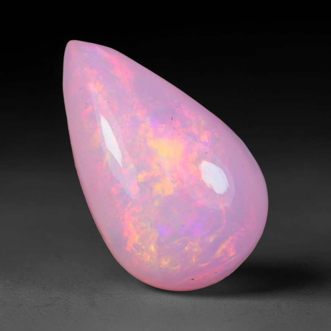2.76 Carats Natural Ethiopian Welo Soft Blush Pink Opal Cabochon Loose Gemstone, 61AG: This teardrop shaped opal displays a gentle blush pink base filled with swirling flashes of warm peach, golden yellow and delicate lavender play of color, measured at 15x9.1x4.8mm, its romantic pastel