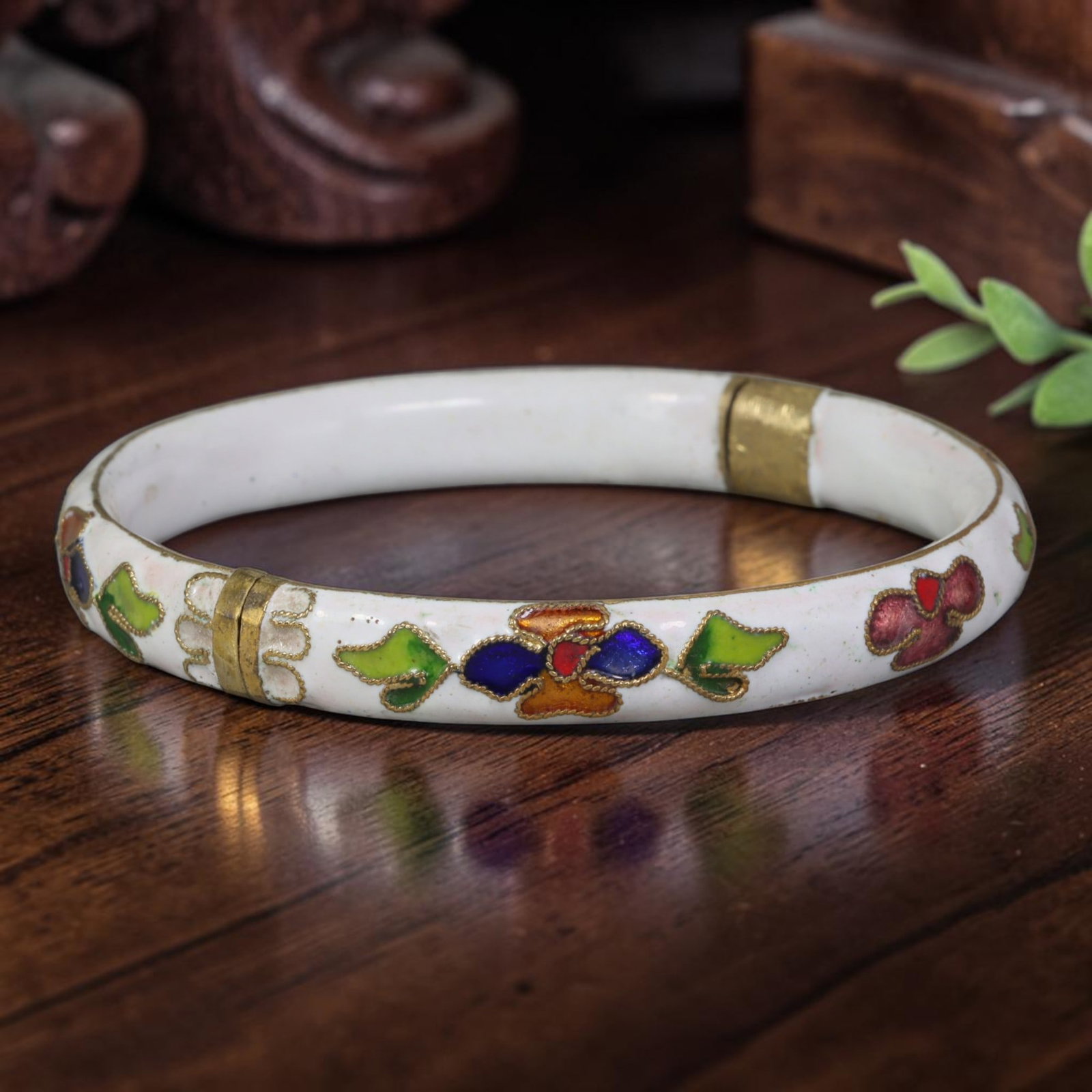 Vintage Chinese Cloisonne Bangle - White Floral Enamel Bracelet, 85FD: Built upon a gilded metal foundation with classic Chinese cloisonne twisted wire filigree craftsmanship, this hinged bangle features an opaque white enamel base adorned with repeating stylized floral 