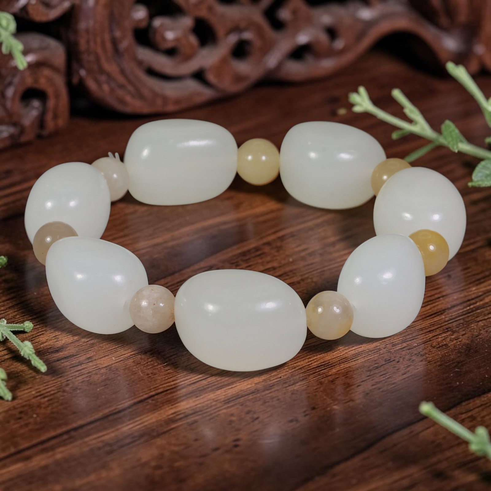 Natural Chinese White Jade Beaded Bracelet - Freeform Jade Pale Stone Spacer Strand, 4AP: Hand-strung bracelet crafted with smooth freeform natural Chinese white jade beads measuring 17mm, separated by small round pale yellow and beige mineral stone spacer beads to accentuate the soft milk