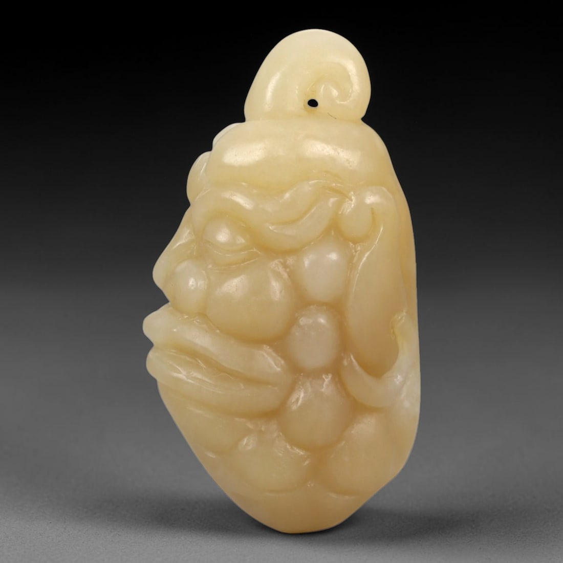 A Chinese Jade Anthropomorphic Head Carving, 20th Century, 34FA (1 of 2)