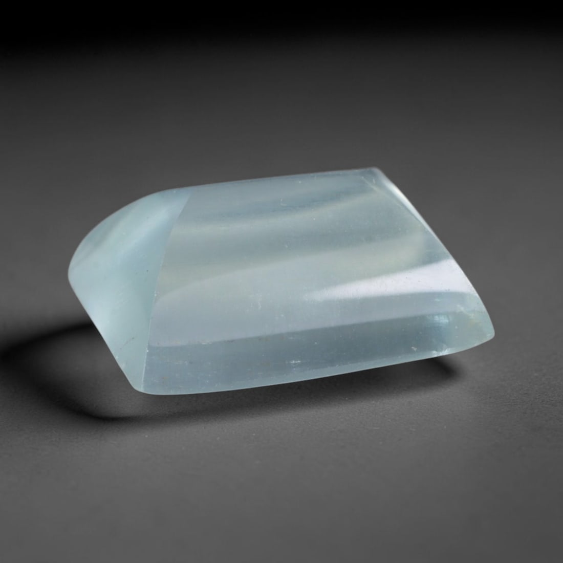 3.88 Carats Natural Brazilian Sky Blue Sugarloaf Aquamarine Loose Gemstone, 69AG: This smooth sugarloaf aquamarine features soft milky sky blue coloring with fine natural fibrous internal inclusions that lend gentle diffused luster across its polished surface, measured at 11x9.2x4.