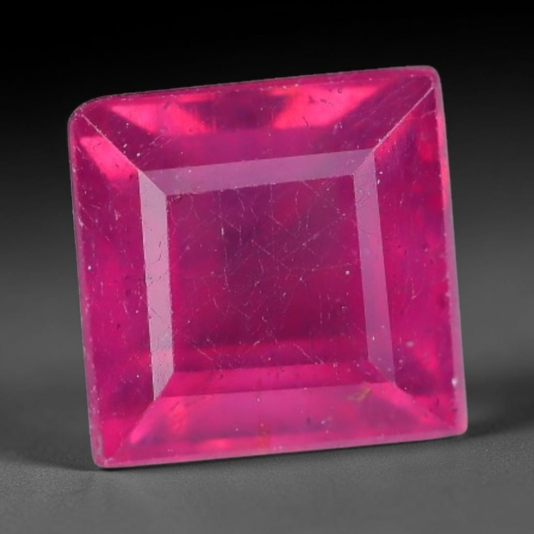 1.90 Carats Natural Madagascar Vivid Fuchsia Red Heated Ruby Loose Gemstone, 9AH: This vivid fuchsia red Madagascar ruby displays rich saturated red tone with subtle natural internal mineral traces that showcase genuine earth-grown character, measured at 6.1x4.4mm, the intense warm