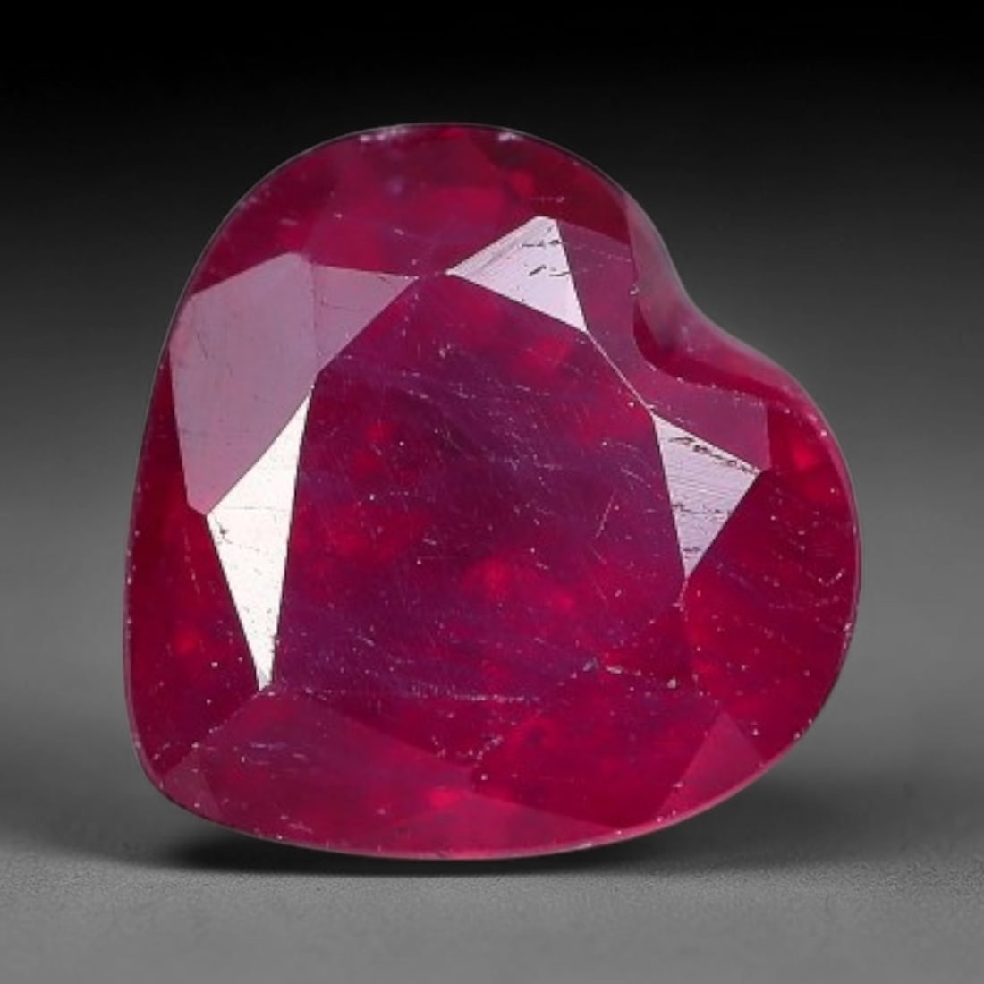 0.94 Carats Natural Madagascar Vivid Fuchsia Red Heated Ruby Loose Gemstone, 22AH: This vivid fuchsia red Madagascar ruby displays rich saturated red tone with subtle natural internal mineral traces that showcase genuine earth-grown character, measured at 5.7x6x3.5mm, the intense wa