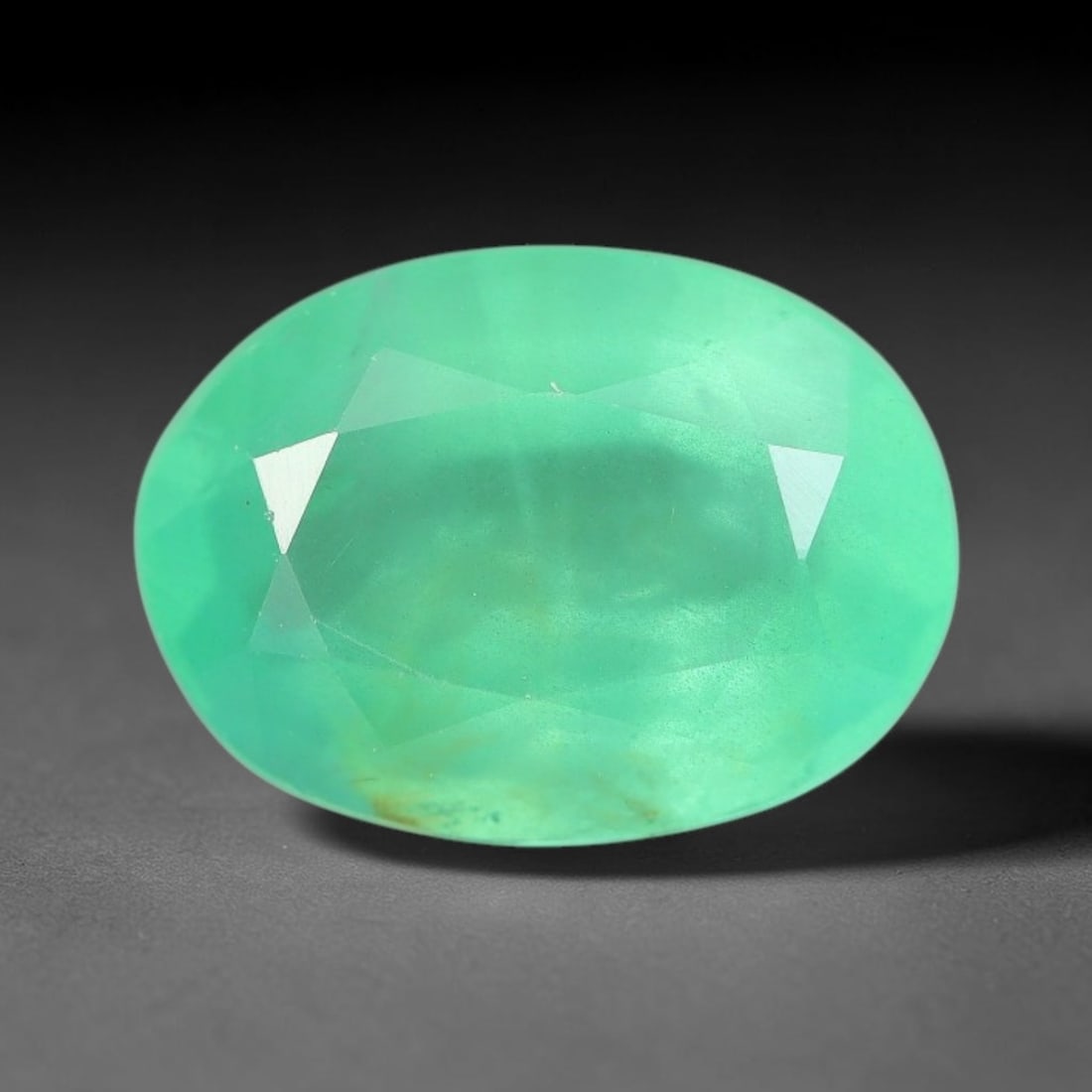 2.13 Carats Natural Zambian Green Emerald Loose Gemstone, 43AH: This green Zambian emerald holds smooth even saturation with subtle faint natural internal markings lending authentic organic character, measured at 9.8x7.1x4.7mm, its calm cool green tone delivers un