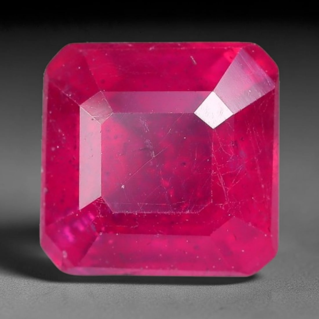 2.46 Carats Natural Madagascar Vivid Fuchsia Red Heated Ruby Loose Gemstone, 4AH: This vivid fuchsia red Madagascar ruby displays rich saturated red tone with subtle natural internal mineral traces that showcase genuine earth-grown character, measured at 7x6.8x4.8mm, the intense wa
