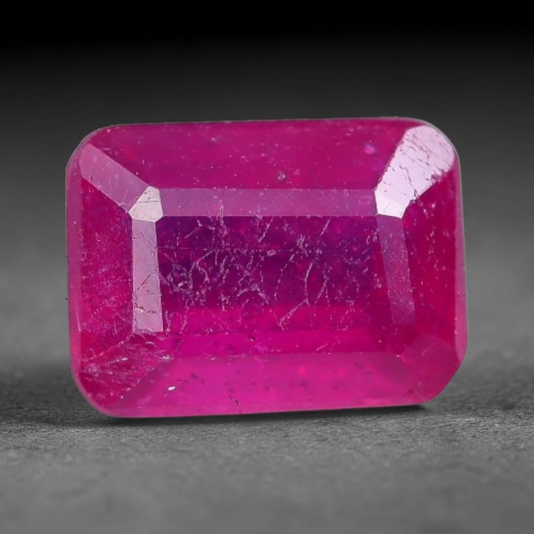 1.43 Carats Natural Madagascar Vivid Fuchsia Red Heated Ruby Loose Gemstone, 3AH: This vivid fuchsia red Madagascar ruby displays rich saturated red tone with subtle natural internal mineral traces that showcase genuine earth-grown character, measured at 7x5.2x3.3mm, the intense wa
