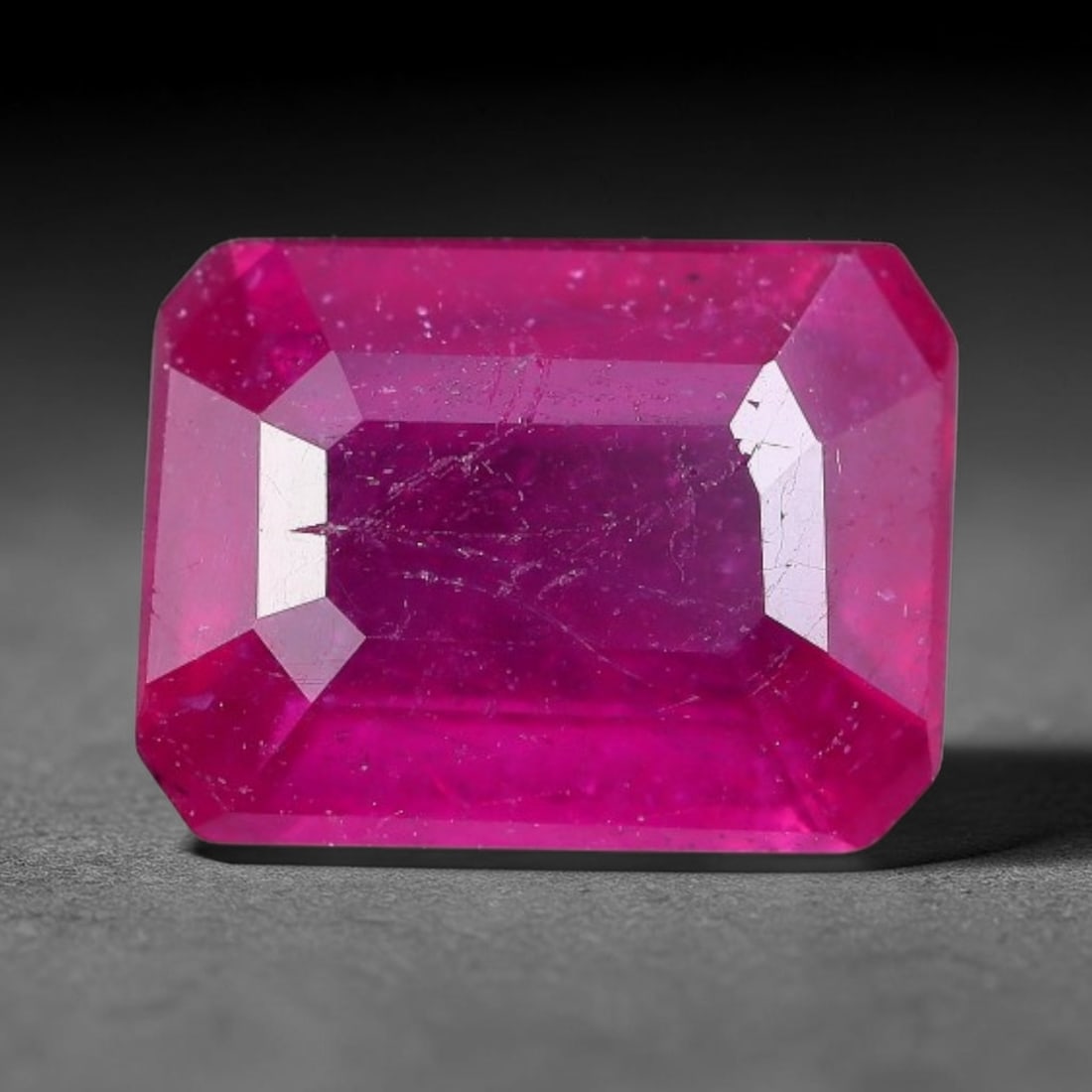 2.11 Carats Natural Madagascar Vivid Fuchsia Red Heated Ruby Loose Gemstone, 100AG: This vivid fuchsia red Madagascar ruby displays rich saturated red tone with subtle natural internal mineral traces that showcase genuine earth-grown character, measured at 8.1x6.1x3.6mm, the intense 
