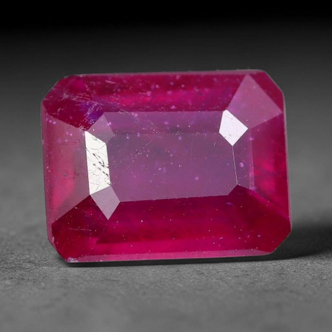 2.33 Carats Natural Madagascar Vivid Fuchsia Red Heated Ruby Loose Gemstone, 1AH: This vivid fuchsia red Madagascar ruby displays rich saturated red tone with subtle natural internal mineral traces that showcase genuine earth-grown character, measured at 8x6.2x3.8mm, the intense wa