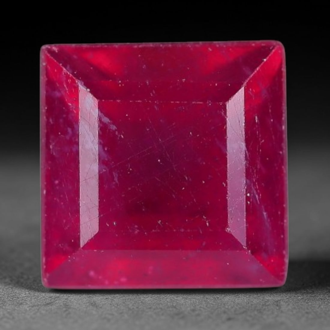 1.94 Carats Natural Madagascar Vivid Fuchsia Red Heated Ruby Loose Gemstone, 98AG: This vivid fuchsia red Madagascar ruby displays rich saturated red tone with subtle natural internal mineral traces that showcase genuine earth-grown character, measured at 6.1x4.5mm, the intense warm