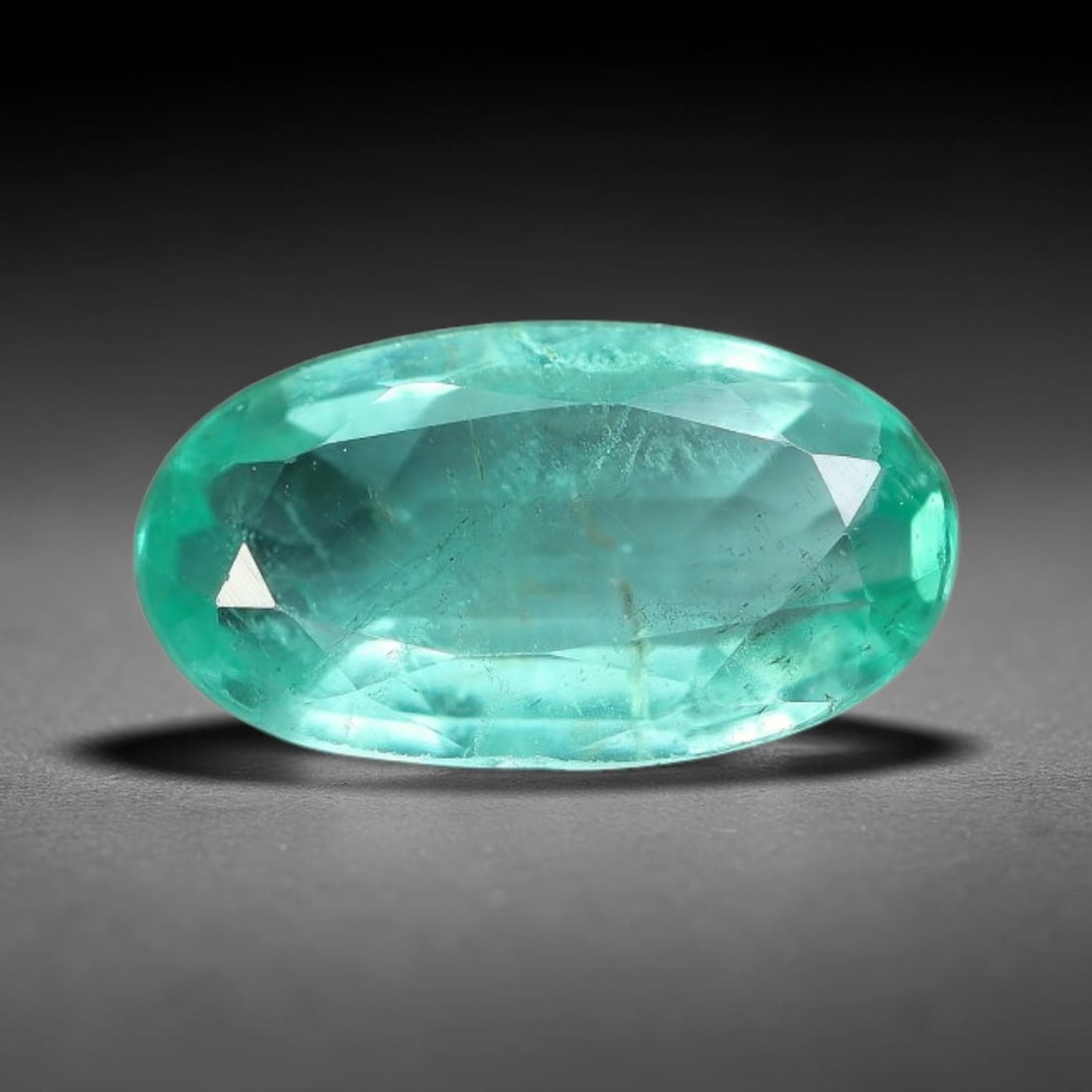 0.87 Carats Natural Zambian Green Emerald Loose Gemstone, 49AH: This green Zambian emerald holds smooth even saturation with subtle faint natural internal markings lending authentic organic character, measured at 8.9x4.8x2.8mm, its calm cool green tone delivers un
