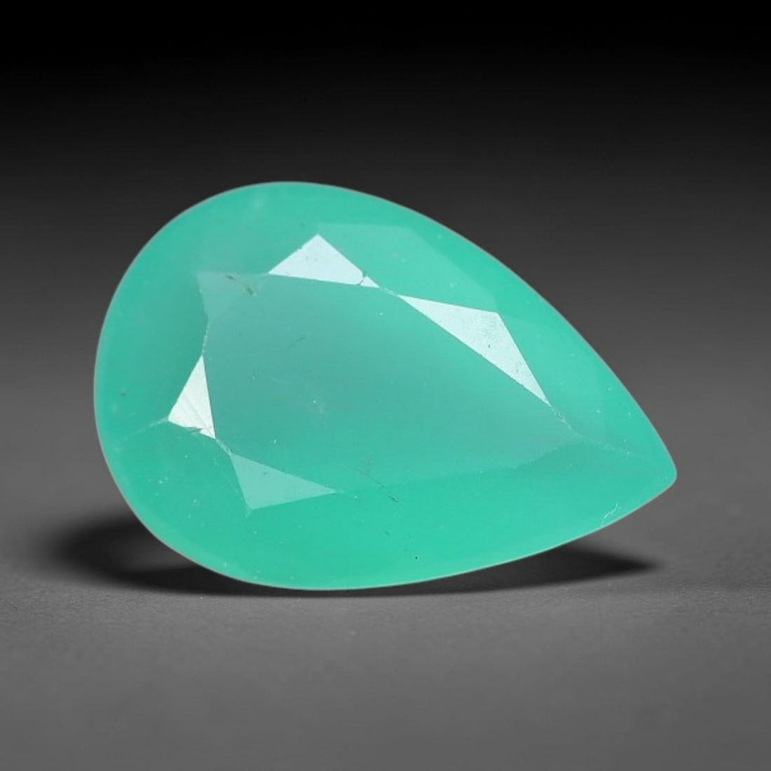 1.04 Carats Natural Zambian Green Emerald Loose Gemstone, 47AH: This green Zambian emerald holds smooth even saturation with subtle faint natural internal markings lending authentic organic character, measured at 8.6x5.8x3.7mm, its calm cool green tone delivers un