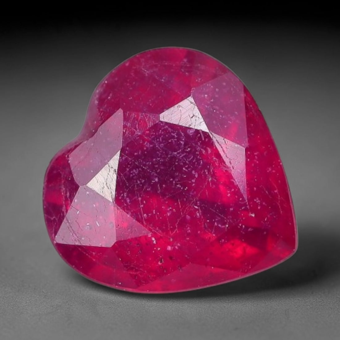 1.52 Carats Natural Madagascar Vivid Fuchsia Red Heated Ruby Loose Gemstone, 18AH: This vivid fuchsia red Madagascar ruby displays rich saturated red tone with subtle natural internal mineral traces that showcase genuine earth-grown character, measured at 7x4mm, the intense warm cri