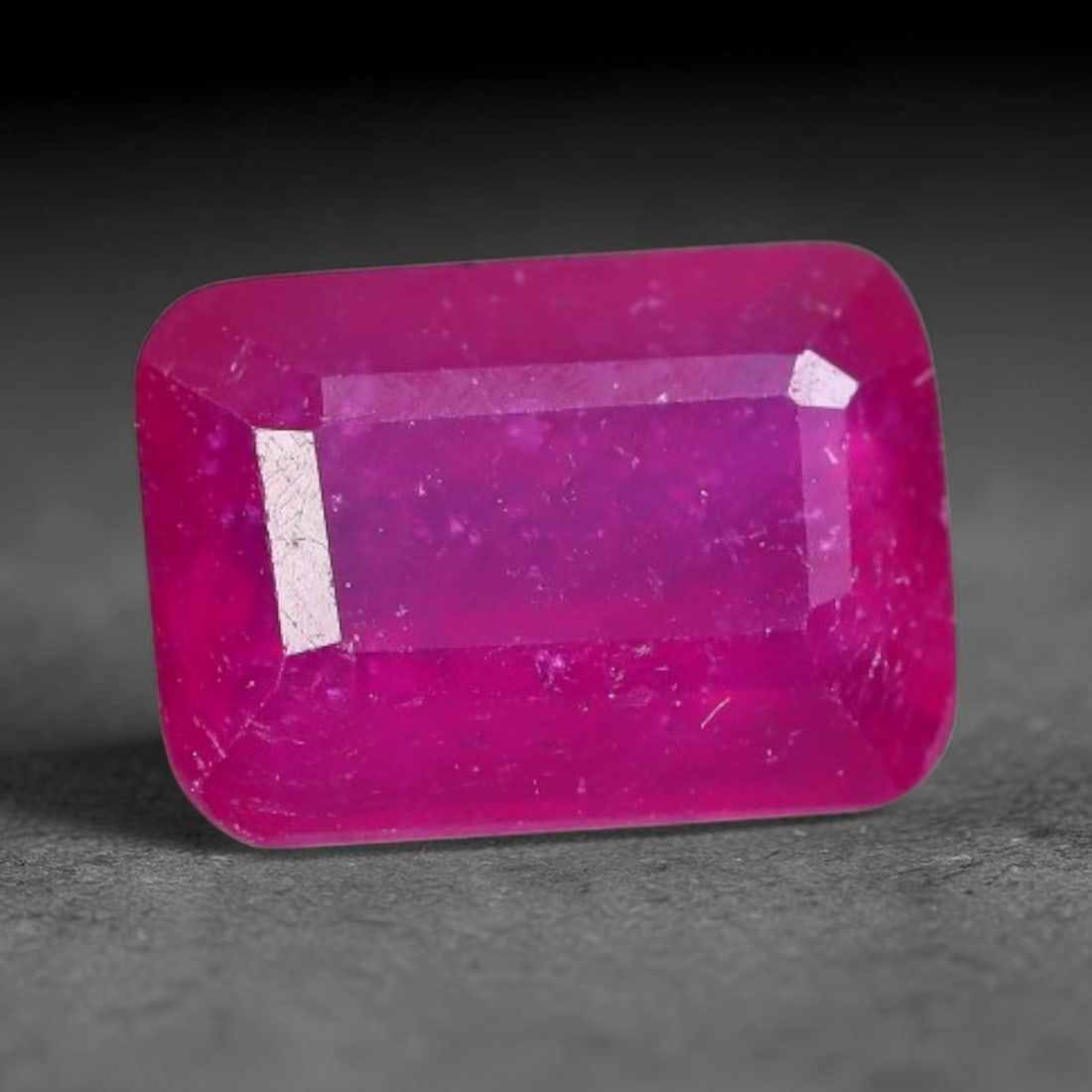 1.42 Carats Natural Madagascar Vivid Fuchsia Red Heated Ruby Loose Gemstone, 2AH: This vivid fuchsia red Madagascar ruby displays rich saturated red tone with subtle natural internal mineral traces that showcase genuine earth-grown character, measured at 7x5x3.4mm, the intense warm