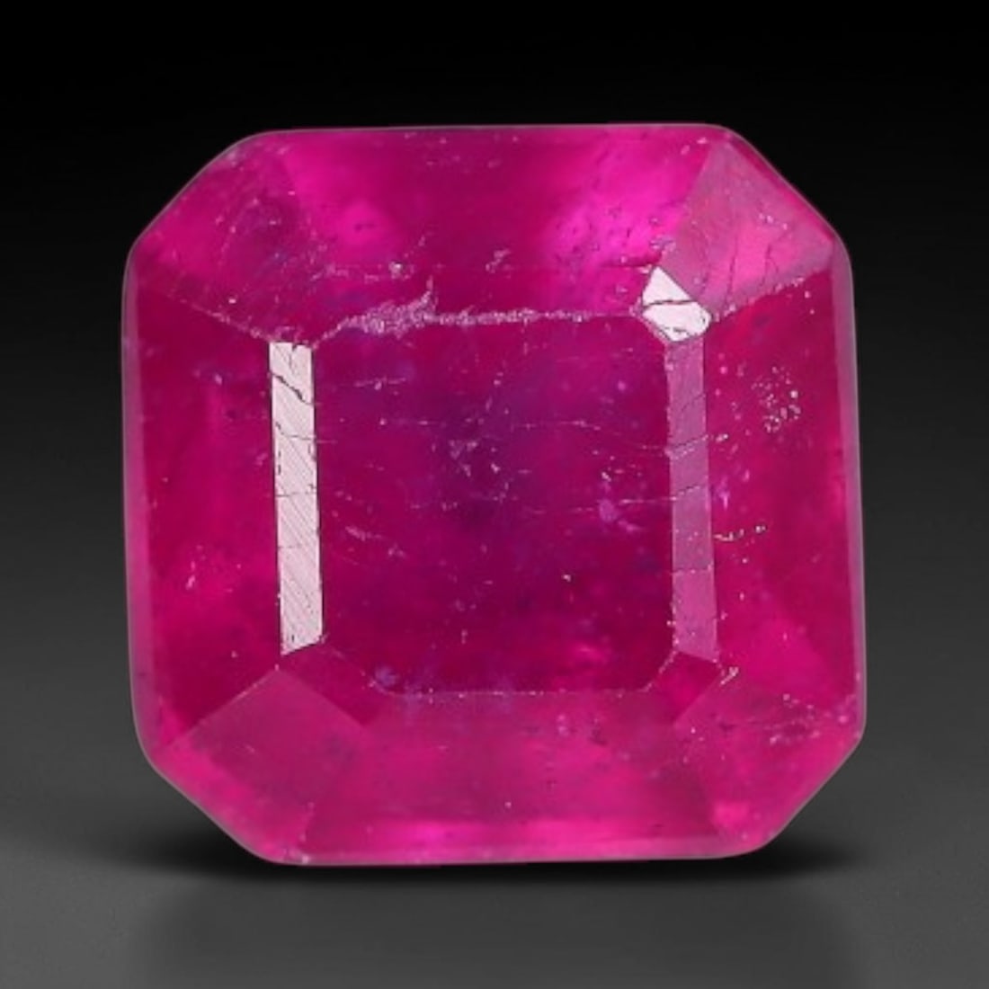 0.95 Carats Natural Madagascar Vivid Fuchsia Red Heated Ruby Loose Gemstone, 15AH: This vivid fuchsia red Madagascar ruby displays rich saturated red tone with subtle natural internal mineral traces that showcase genuine earth-grown character, measured at 5.1x3.6mm, the intense warm