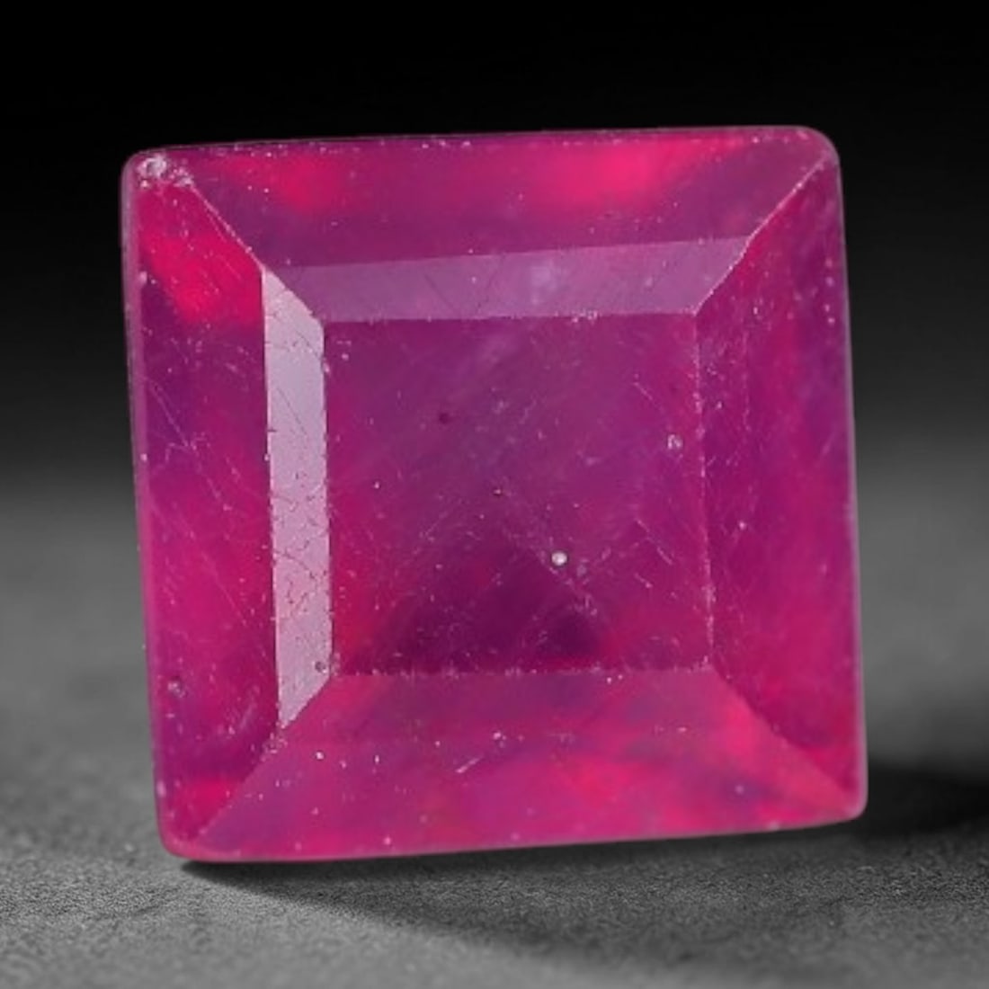 0.98 Carats Natural Madagascar Vivid Fuchsia Red Heated Ruby Loose Gemstone, 7AH: This vivid fuchsia red Madagascar ruby displays rich saturated red tone with subtle natural internal mineral traces that showcase genuine earth-grown character, measured at 5x3.3mm, the intense warm c