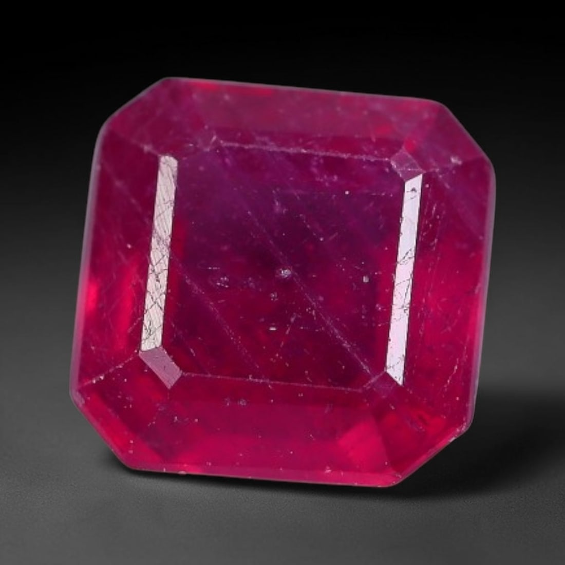 1.37 Carats Natural Madagascar Vivid Fuchsia Red Heated Ruby Loose Gemstone, 14AH: This vivid fuchsia red Madagascar ruby displays rich saturated red tone with subtle natural internal mineral traces that showcase genuine earth-grown character, measured at 6.1x3.5mm, the intense warm
