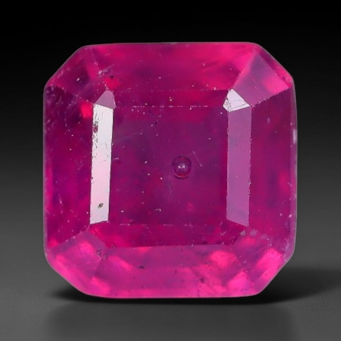 1.51 Carats Natural Madagascar Vivid Fuchsia Red Heated Ruby Loose Gemstone, 97AG: This vivid fuchsia red Madagascar ruby displays rich saturated red tone with subtle natural internal mineral traces that showcase genuine earth-grown character, measured at 5.9x4.5mm, the intense warm