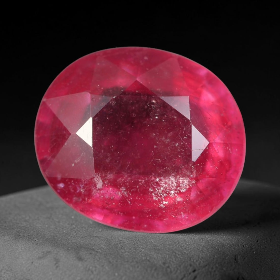 5.30 Carats Natural Madagascar Vivid Magenta Red Ruby Loose Gemstone, 55AH: This vivid magenta-hued Madagascar ruby boasts rich saturated red-pink saturation scattered with tiny fine mineral specks and distinct two-phase fluid bubble inclusions throughout its translucent crys