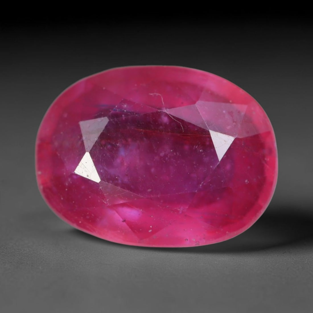 3.90 Carats Natural Madagascar Vivid Magenta Red Ruby Loose Gemstone, 79AH: This vivid magenta-hued Madagascar ruby boasts rich saturated red-pink saturation scattered with tiny fine mineral specks and distinct two-phase fluid bubble inclusions throughout its translucent crys